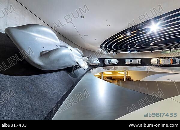 Silver Arrows - Races and Records. Mercedes Museum; Stuttgarts most visited museum is part of the Mercedes-Benz World in Untertürkheim and reminds us of the early days of the automobile with its vehicles and vintage cars; Architecture Ben van Berkel; Architekturbüro UNStudio; Stuttgart; Baden-Württemberg; Germany; Europe.