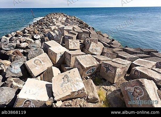 Pictures of famous musicians painted on stones at the Auditorio de Tenerife, Santa Cruz de Tenerife, Canarias, Spain