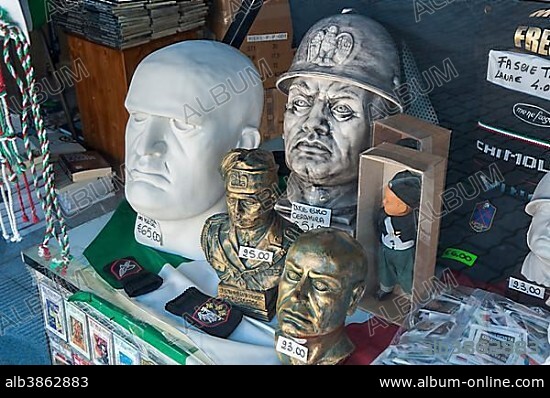 Souvenir shop, heads of Mussolini and fascist symbols in a shop window, glorification of fascism, birthplace of Mussolini, Predappio, Emilia-Romagna, Italy, Europe.