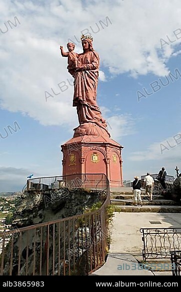 Notre Dame de France, statue on the top of Corneille rock, Le Puy en Velay, departure of Saint Jacques de Compostelle way, Haute Loire, Auvergne, France, Europe.