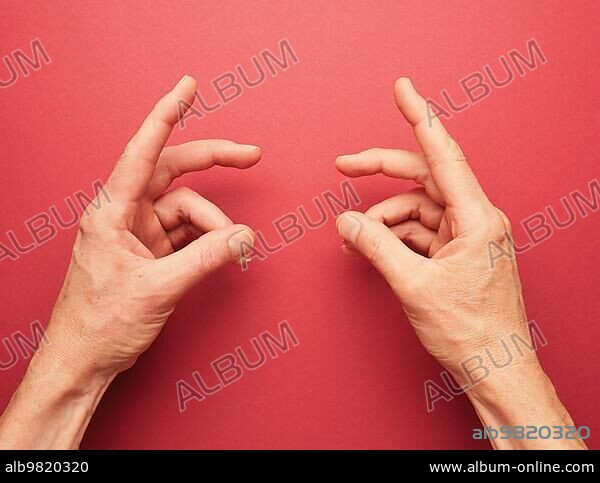 Hand position for mudra no. 6 in Jin Shin Jyutsu; alternative healing method or self-help concept; Asian medicine; awareness raising.
