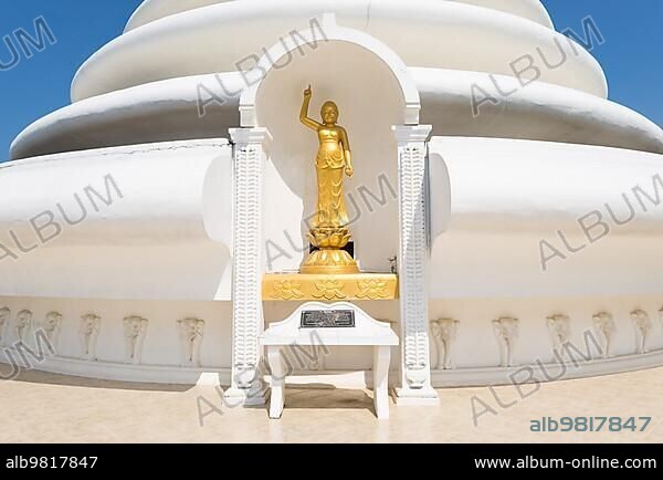 Buddha sculpture. Prince Siddhartha. Birth. Plastic art at the Stupa of the Japanese Peace Pagoda on top of the Rumassala hill in the Jungle of Unawatuna.