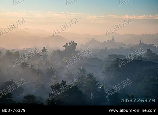 Pagoda in the mist, in the morning light, Mrauk U, Sittwe District, Rakhine State, Myanmar, Asia.
