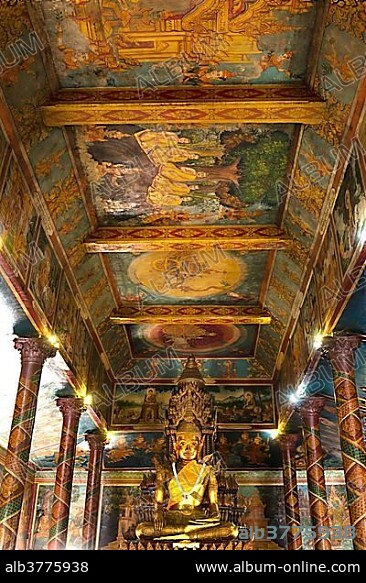Bronze Statue and ceiling paintings, Buddha statue in the temple Phnom Penh, Cambodia, Asia.
