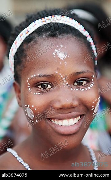 Portrait of Xhosa girl with traditional adornment, Grahamstown, Eastern Cape, South Africa, Africa.