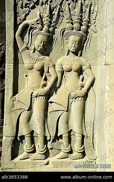 Stone relief showing charming Apsera temple dancers, Angkor Wat Temple, Siem Reap, Cambodia, Southeast Asia, Asia.