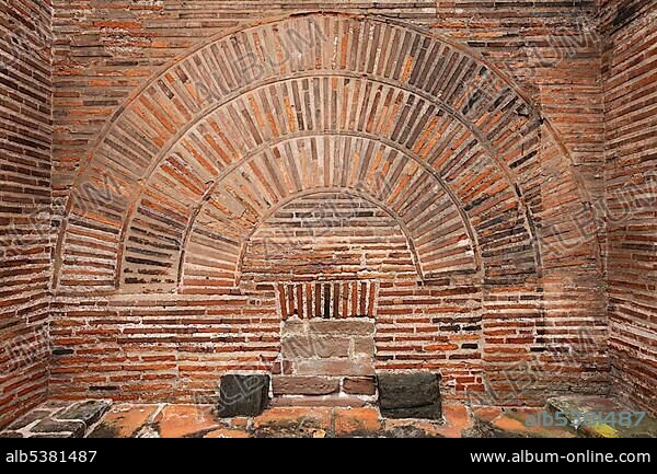 Roman wall with brick round arch above a sewer, Basilica of Constantine the Great, Trier, Rhineland-Palatinate, Germany, Europe.