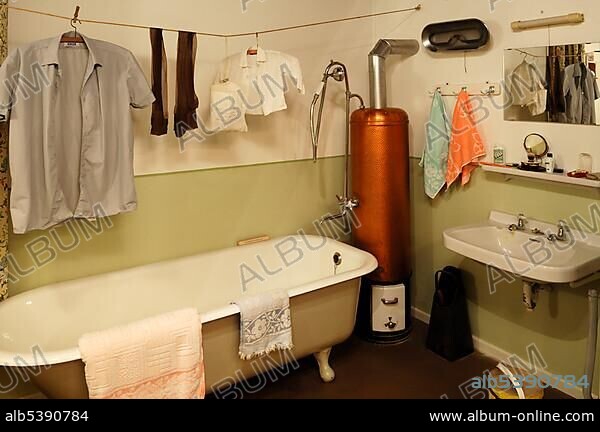 Bathroom from the 1950s with laundry hanging, a bathtub and a water heater, 1950s Exhibition 2010-2011, German Salt Museum, Suelfmeisterstrasse 1, Lueneburg, Lower Saxony, Germany, Europe.