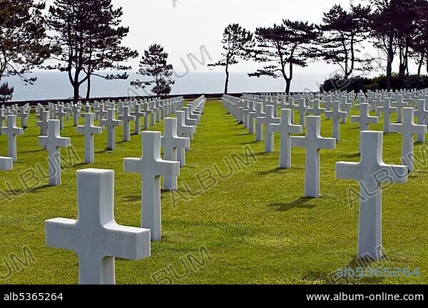 Crosses, made of marble, American military cemetery at Omaha Beach near Colleville sur Mer, Normandy, France, Europe.