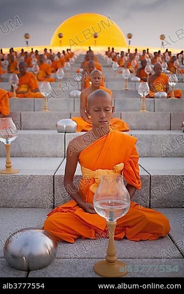 Wat Phra Dhammakaya temple on Makha Bucha Day or Magha Puja Day, Theravada Buddhists, monks sitting around the Chedi Mahadhammakaya Cetiya, Khlong Luang District, Pathum Thani, Bangkok, Thailand, Asia *** IMPORTANT: Image must not be used in a negative context with the Dhammakaya temple ***.