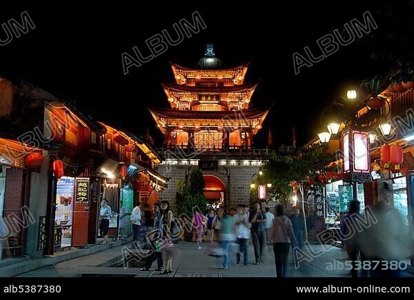 Architecture, night scene, illuminated Chinese tower, pedestrian zones, houses in the old town, Dali, Yunnan, People's Republic of China, Asia.