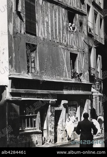The oldest house in Paris, built at the end of the 14th century in the 3d arrondissement. Picture taken in March 1936.