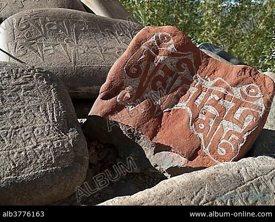 Mani stones with the carved "Om Mani Padme Hum", the mantra of Avalokiteshvara, the Buddha of Compassion, Thiksey, Jammu and Kashmir, India, Asia.