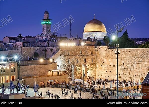 Jerusalem Israel. Dome of the rock, temple mount and wailing wall at sunset.