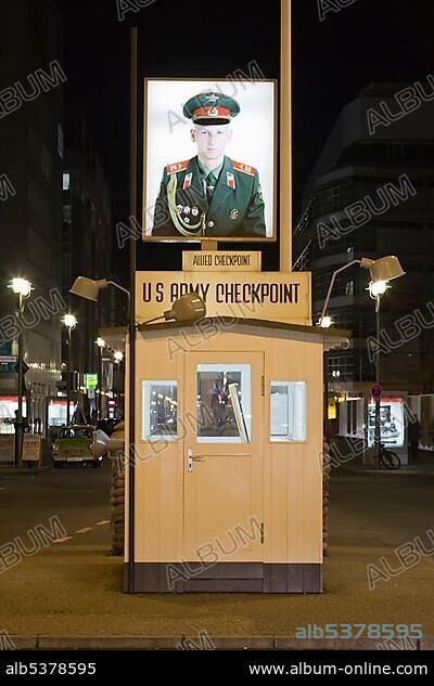 Portrait of a Russian soldier at the former border crossing Checkpoint Charlie, Berlin, Germany, Europe.