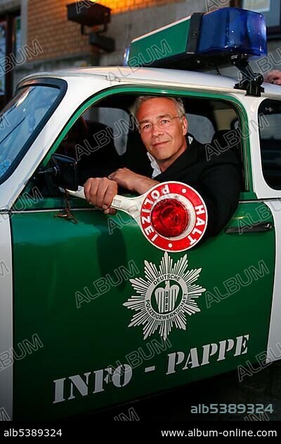 Klaus J. Behrendt, actor, "Tatort", German TV crime series, sitting in a police Trabant car.