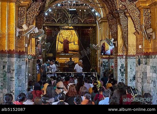 Golden Buddha and Prayer Room, Mahamuni Pagoda, Mandalay, Myanmar, Asia.