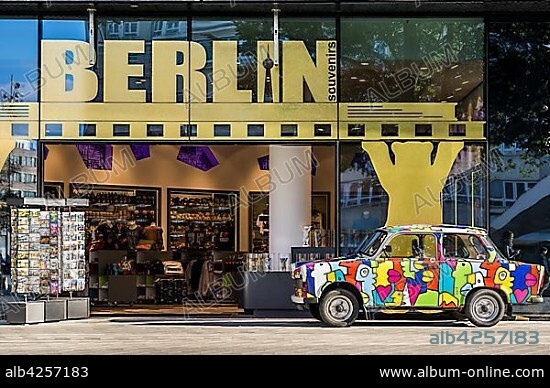 Souvenir shop with colourful Trabant car at Alexanderplatz square, Berlin, Germany, Europe.