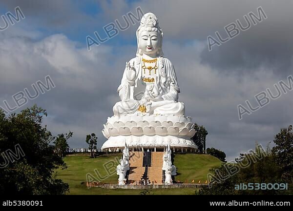 Giant Guan Yin statue sitting on lotus flower, Wat Huay Pla Kang Temple, Chiang Rai, Northern Thailand, Thailand