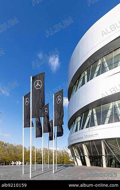 Mercedes Benz Museum Stuttgart, in front of it black flags with the logo of Mercedes, Mercedes star, Stuttgart, Baden-Württemberg, Germany, Europe.