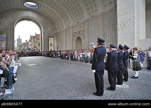Last Post Ceremony under the Menin Gate Memorial to the Missing, a war memorial dedicated to the commemoration of British and Commonwealth soldiers who were killed in the Ypres Salient of World War I, Ypres, Belgium, Europe.