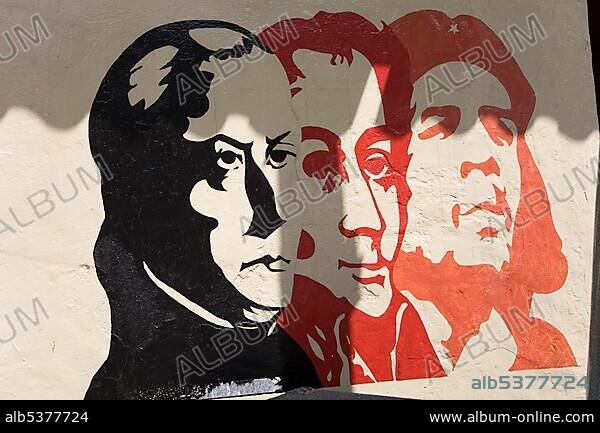 Graffiti of the old and the young Bolivar and of Che Guevara, Venezuela, South America.