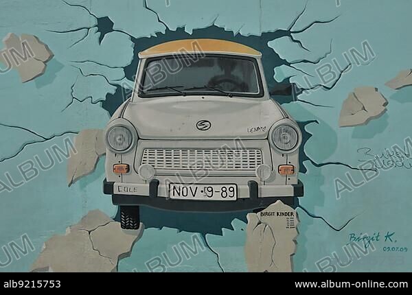 Birgit Kinder, "Test the Best", mural, painting of a Trabant car breaking through the Berlin Wall, by Birgit Kinder, East Side Gallery, Berlin-Friedrichshain, Germany, Europe, PublicGround, Europe.