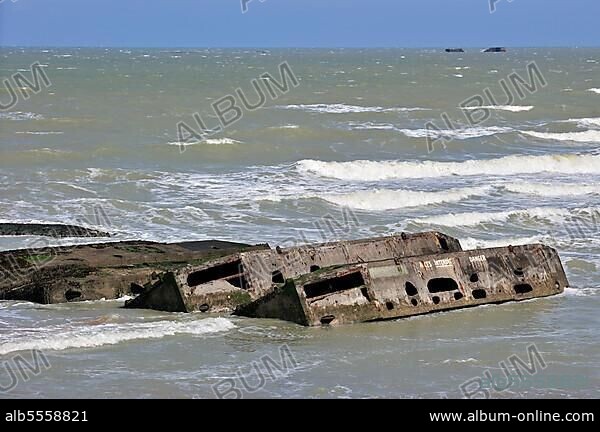 Concrete boxes, known as Phoenix Caissons, in the sea were used as breakwaters and to form an improvised harbour, Mulberry harbour, off Gold Beach during World War II near Arromanches, Normandy, France, Europe.
