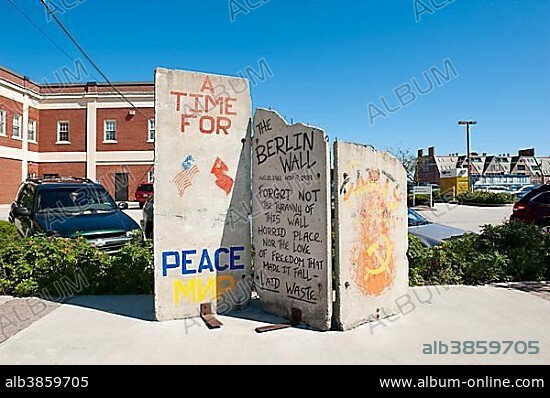 Three panels of the Berlin Wall, graffiti The Berlin Wall, on display at Long Wharf, Portland, Maine, New England, USA, North America, America, North America.