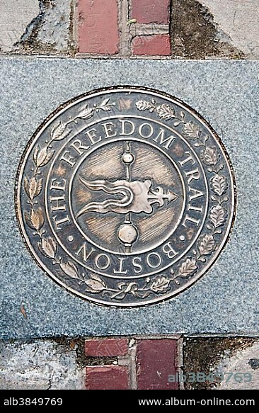 Metal plate on the floor marking the Freedom Trail tour route, Boston, Massachusetts, New England, USA, North America.