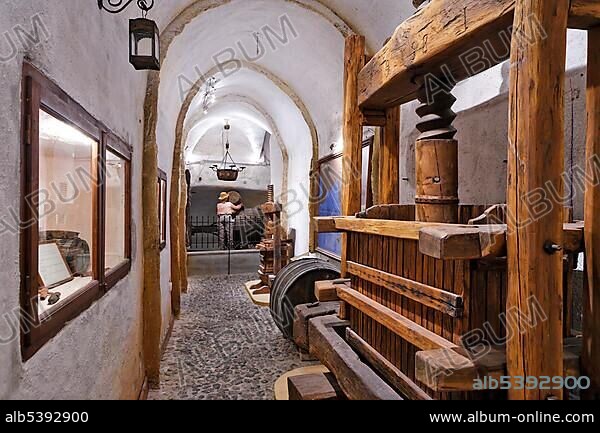 An old wooden vine press, wine museum and vinery Koutsouyanopoulos, Santorini, Greece, Europe.