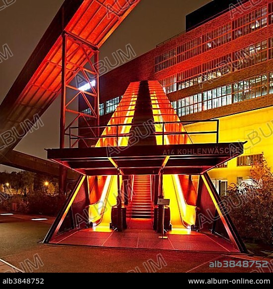Illuminated gangway to the Ruhr Museum at the Zeche Zollverein Coal Mine Shaft XII, Essen, Ruhr area, North Rhine-Westphalia, Germany, Europe.