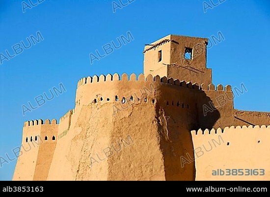 High walls with battlement Ko'xna Ark fortress old town Khiva Uzbekistan.