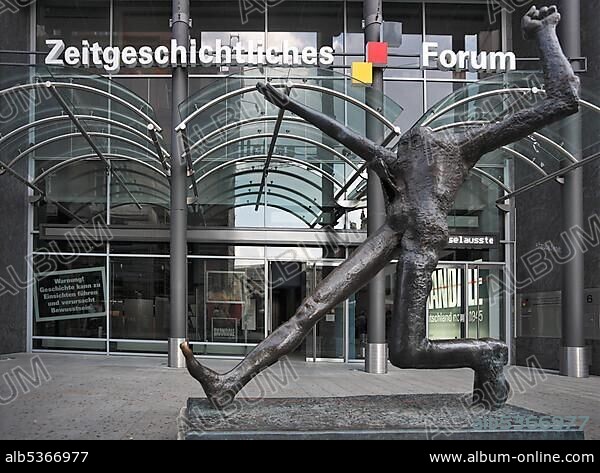 Der Jahrhundertschritt, the Century Step, by Wolfgang Mattheuer at the entrance to the Forum of Contemporary History, Zeitgeschichtliches Forum, Leipzig, Saxony, Germany, Europe.
