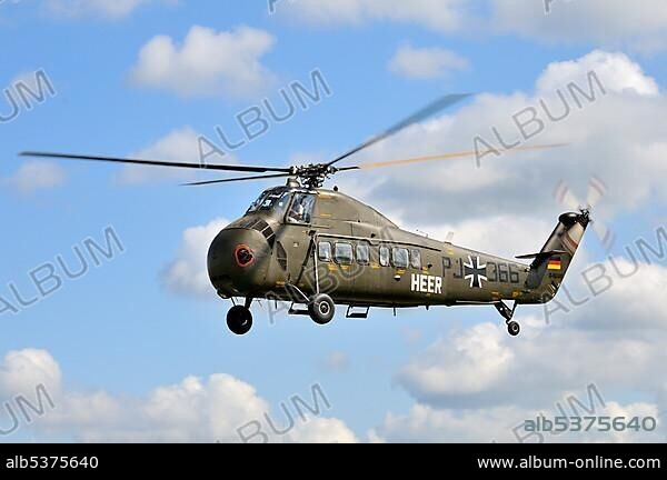 American transport helicopter Sikorsky S-58C during a flight demonstration, Europe's largest meeting of vintage planes at Hahnweide, Kirchheim-Teck, Baden-Wuerttemberg, Germany, Europe.
