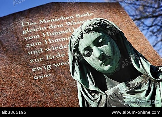Statue of a grieving woman at Ohlsdorf Cemetery in Hamburg, Germany, Europe.