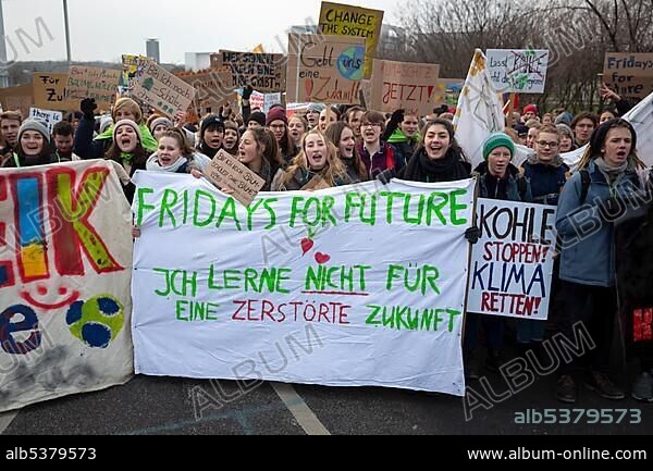 Demonstrators with banner Fridays for Future, demonstration by pupils and young people for climate protection, Berlin, Germany, Europe.