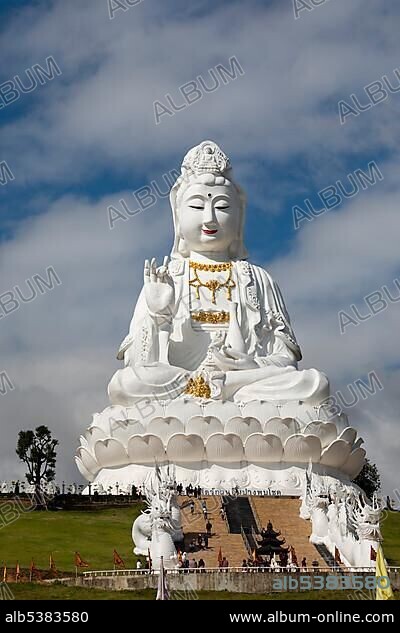 Dragon staircase in front of huge Guan Yin statue at Wat Huay Pla Kang Temple, sitting Buddha on lotus flower, Chiang Rai, Northern Thailand, Thailand, Asia.
