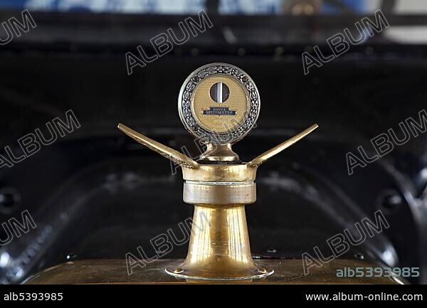 A Boyce Motometer hood ornament and radiator cap that measured the temperature of the water vapor in early cars, on a Model T Ford at the Ford Piquette Avenue Plant, where the first Ford Model T was built in 1908; the building is now a museum called the Model T Automotive Heritage Complex, T-Plex, Detroit, Michigan, USA, North America.
