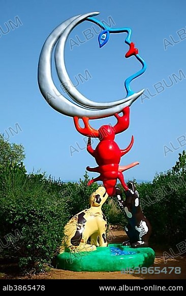 NIKI DE SAINT-PHALLE and JEAN TINGUELY. Colorful sculpture in the Giardino dei Tarocchi or Garden of the Tarot, by Niki de Saint Phalle and Jean Tinguely in Capalbio, Province of Grosseto, Tuscany, Italy, Europe.