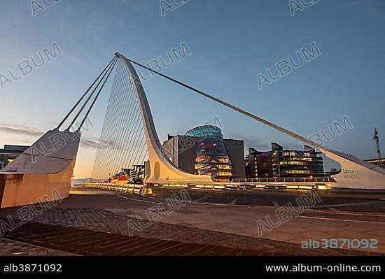 Samuel Beckett Bridge, cable-stayed bridge and swing bridge over the river Liffey, blue hour, architect Santiago Calatrava, Dublin, Republic of Ireland.
