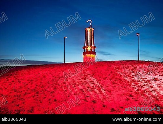 Geleucht, sculpture in the form of a miner's lamp, illuminated on Rheinpreussen slag heap in winter, Meerbeck, Moers, North Rhine-Westphalia, Germany, Europe.