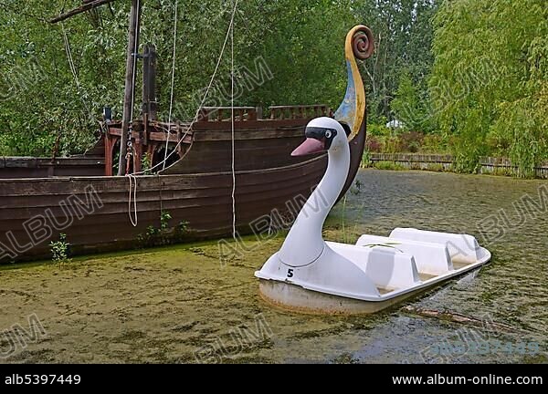Morbid charm of a swan gondola, abandoned Spreepark Berlin amusement park, formerly known as Kulturpark Plaenterwald in the German Democratic Republic, Germany, Europe.