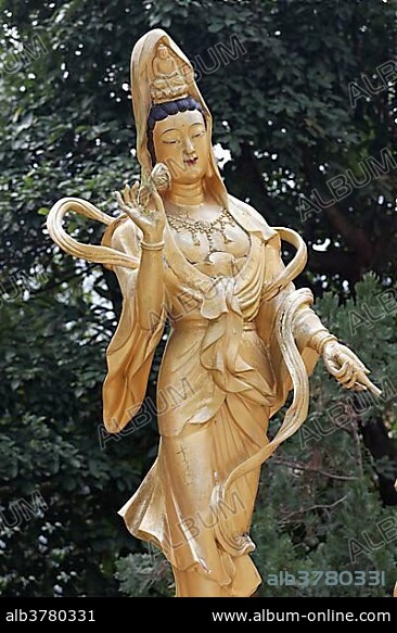 Statue of the Buddhist goddess Gunayin or Kwan Giu or Kwun Yam, female Bodhisattva, Ten Thousand Buddhas Monastery, Sha Tin, New Territories, Hong Kong, China, Asia.