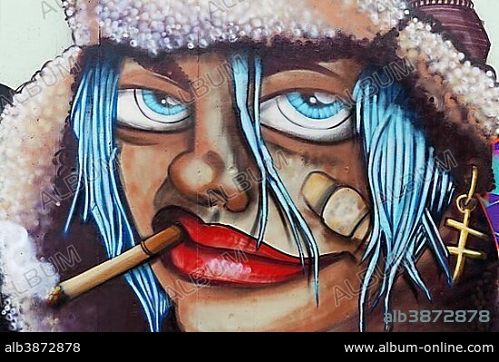 Face of a woman with cigarette and bandaid on cheek, graffiti, street art, Düsseldorf, North Rhine-Westphalia, Germany, Europe.
