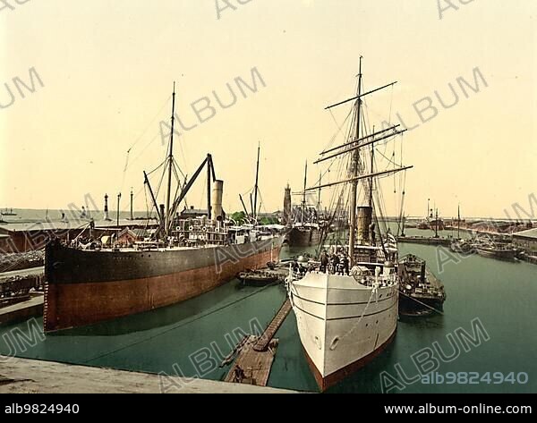 The new harbour and the lighthouse in Bremerhaven; Bremen; Germany; Historic; Photochrome print from the 1890s; Europe.