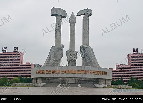 Hammer and sickle and pen, Monument to the Korean Workers Party, Pyongyang, North Korea, Asia.