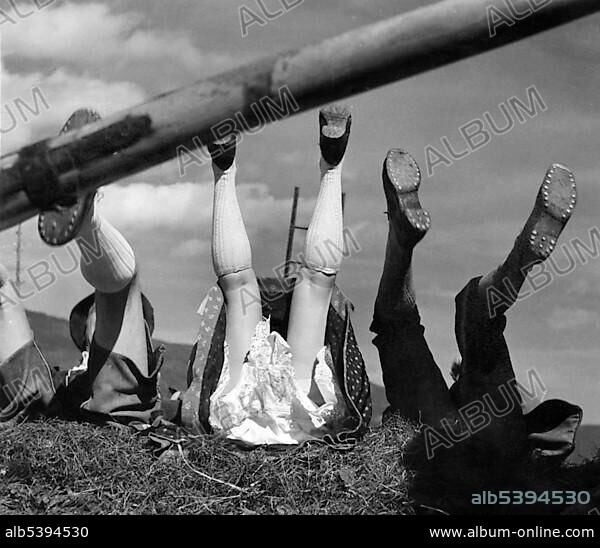Historic photograph, legs in the air, traditional costumes, underwear, around 1930
