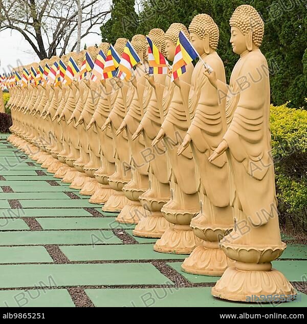 Many Buddha statues in perspective at the buddhist temple in Foz do iguacu, Brazil, South America.