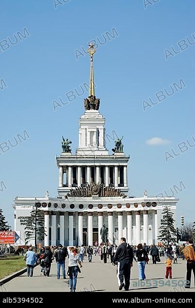 Moscow VVTs or VDNKh, All Russian Exhibition Centre, central pavilion, and many people on a sunny week-end day, Moscow, Russia, Europe.